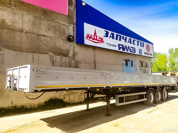 Бортовой полуприцеп МАЗ 975800