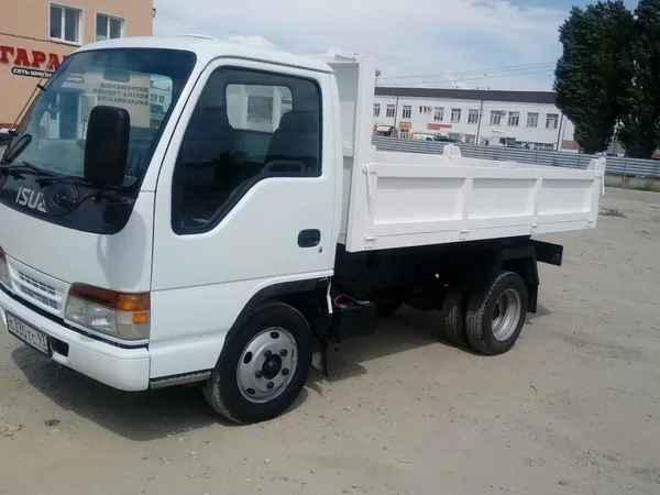 Бортовой автомобиль Isuzu NMR85