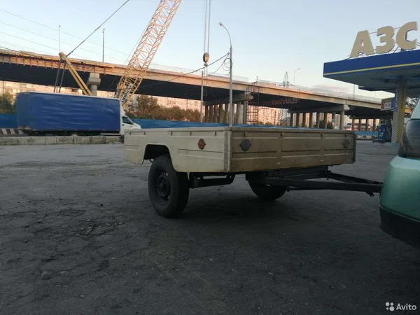 Легковой бортовой прицеп
