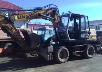 Колесный экскаватор Unex 12