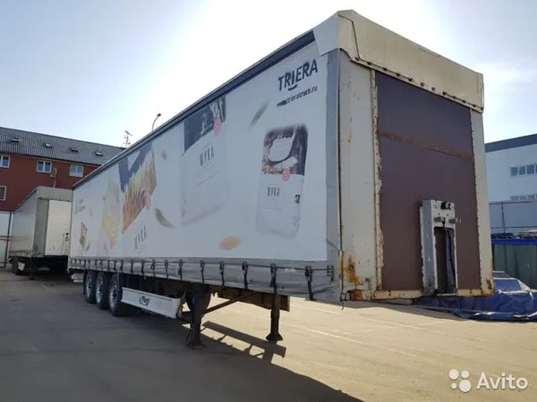 Тентованный полуприцеп Fliegl
