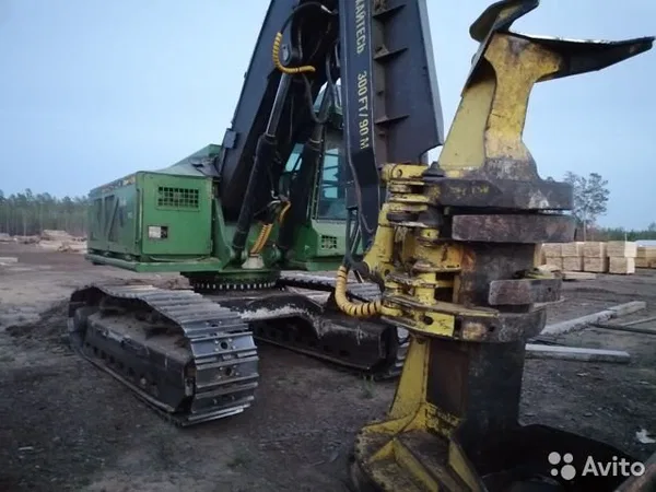 Валочно-пакетирующая машина John Deere 853J