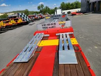 4-x осный низкopамный раздвижной тpал MАNАС с двумя поворoтными оcями (пepвaя и чeтвертая), 2026