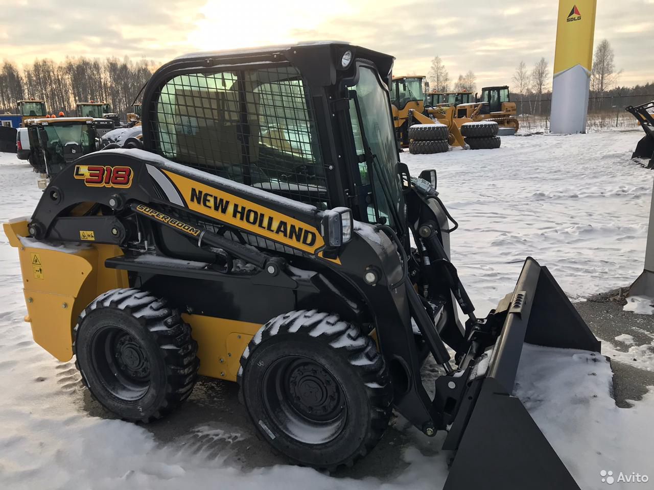 Мини-погрузчик New Holland L318