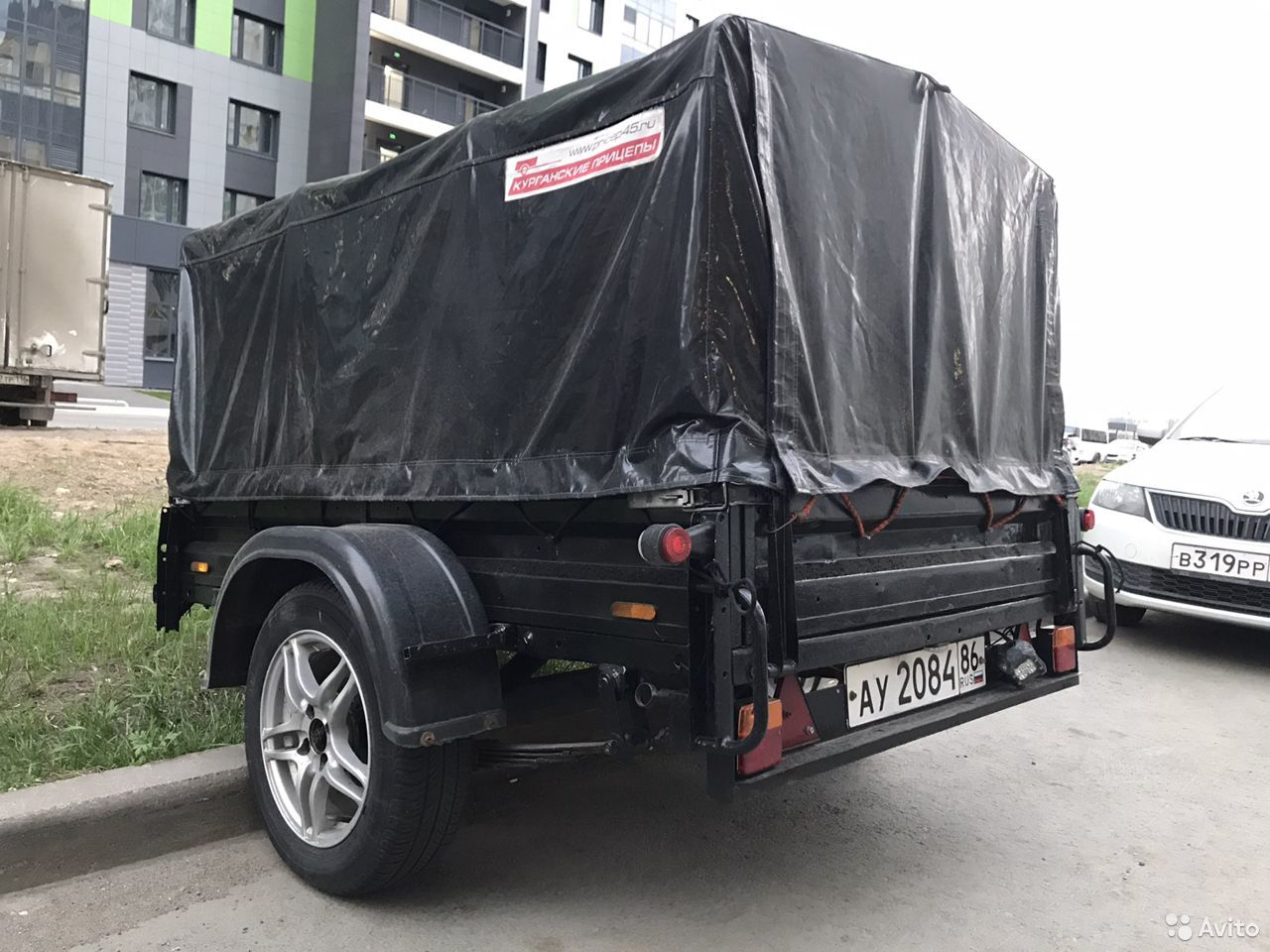 Легковой прицеп с тентом Курганские прицепы